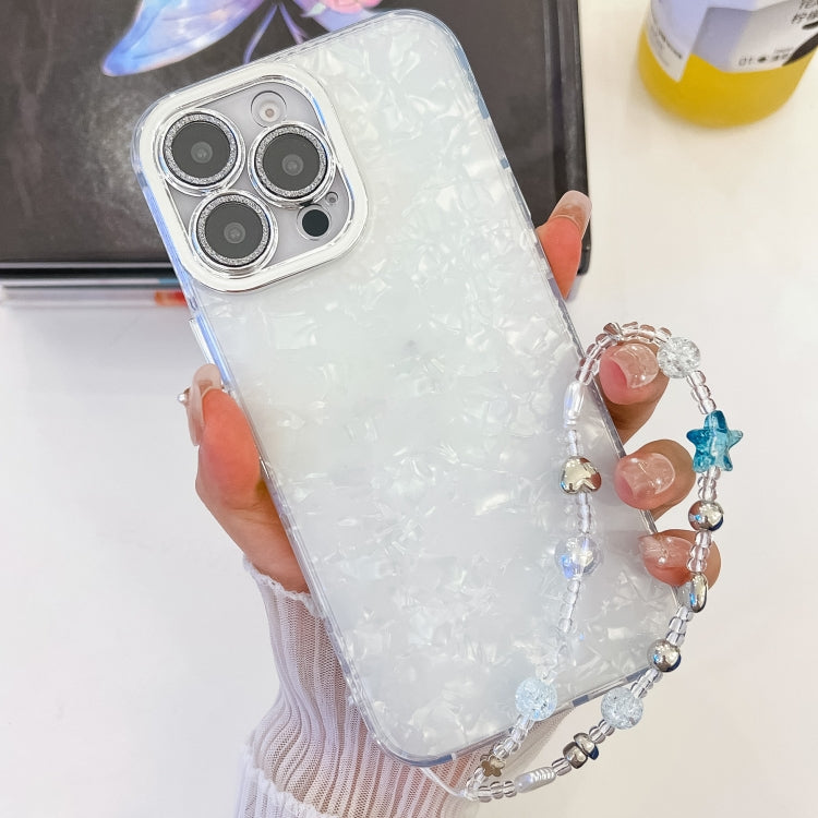 For iPhone 16 Plus Plating Glitter Texture Chain Wristband TPU Phone Case with Lens Film(White Shell Pattern) - iPhone 16 Plus Cases by buy2fix | Online Shopping UK | buy2fix