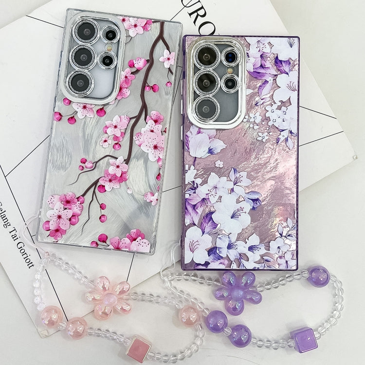 For Samsung Galaxy S25 5G Electroplating Flowers Plants Texture Wristband TPU Phone Case(Pale Purple FlowerFL11) - Galaxy S25 5G Cases by buy2fix | Online Shopping UK | buy2fix